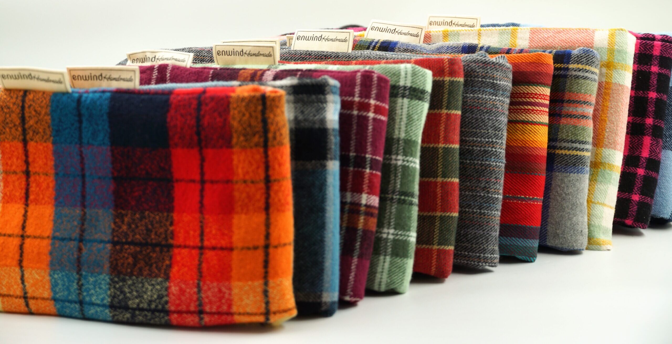 Handmade hot water bottle covers in various colorful fabrics